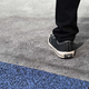 Shag can touch the plush carpet in Haier’s booth.